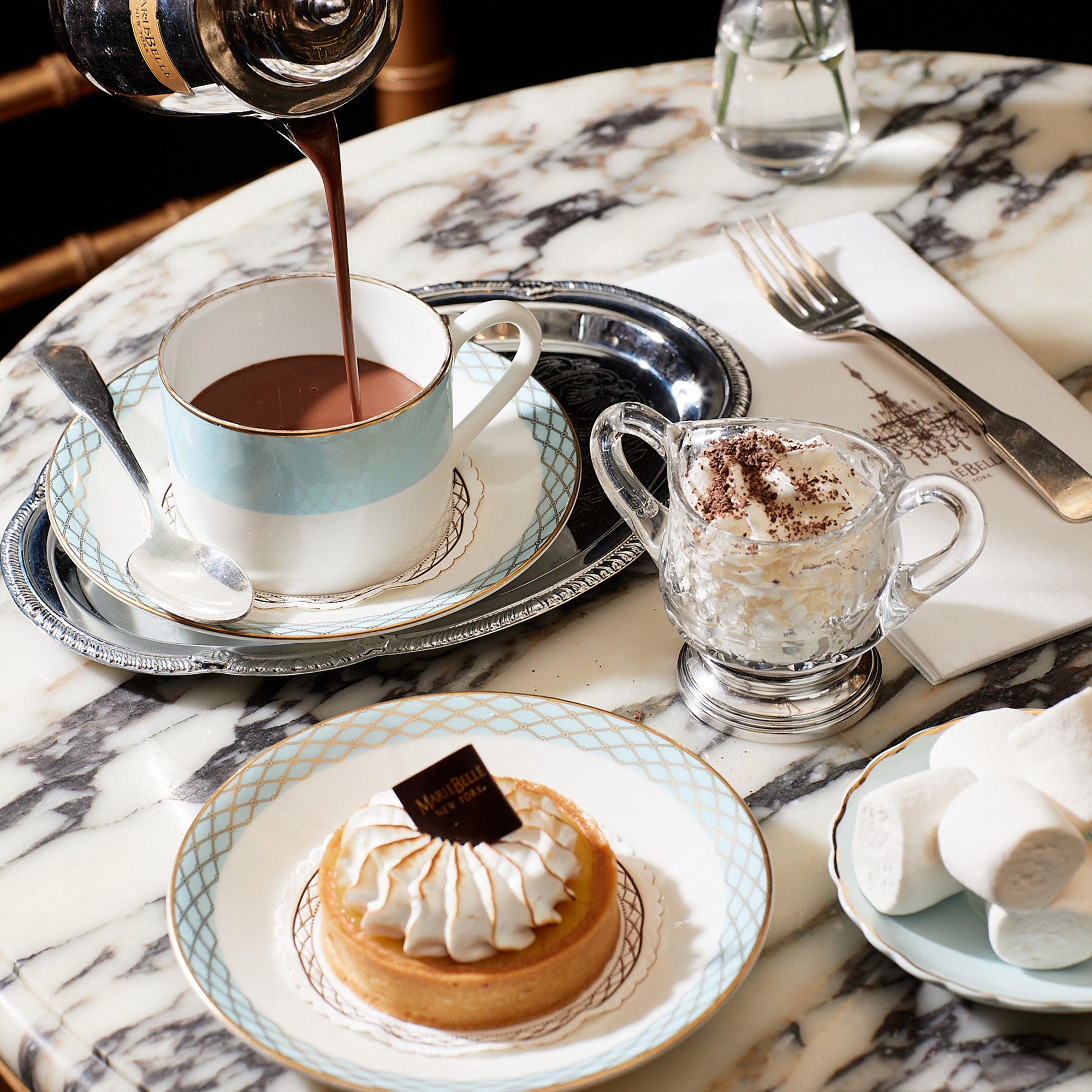 Hot Chocolate Being Poured into a Cup