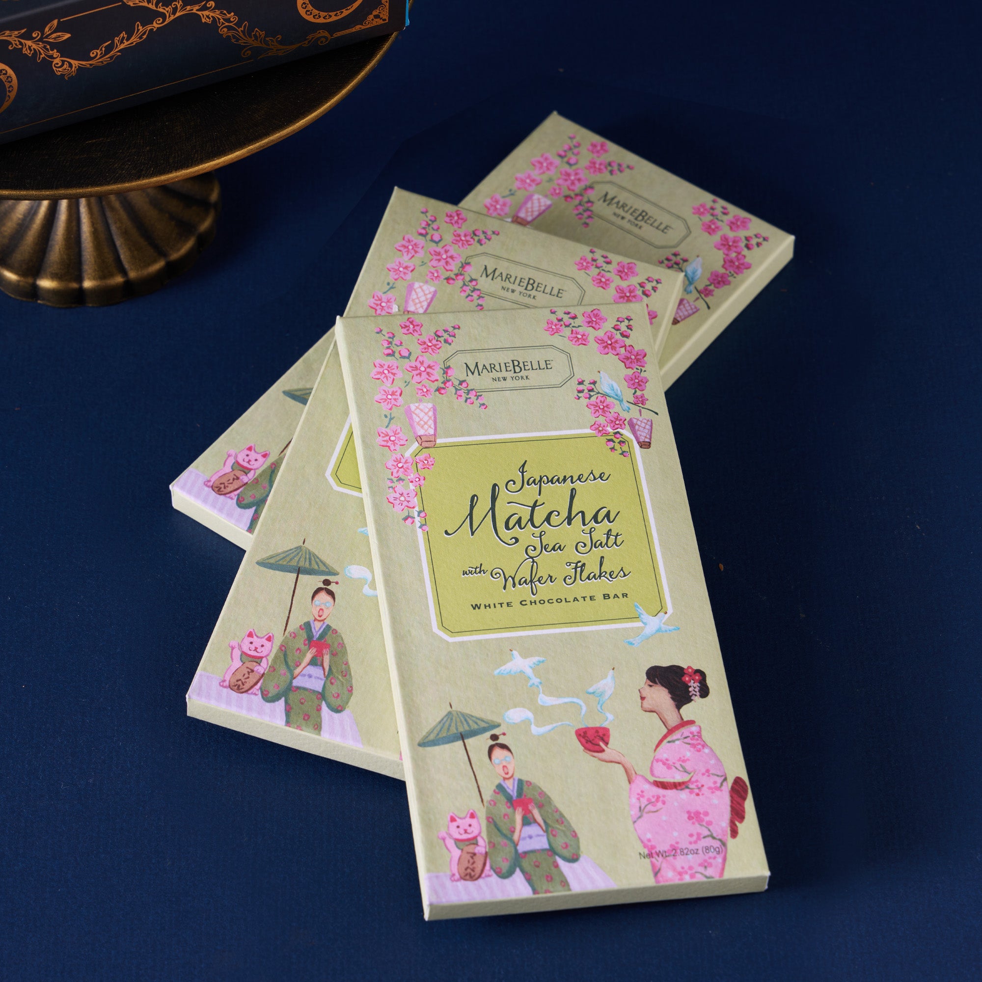 Marie Belle Japanese Matcha White Chocolate Bar packaging on a dark blue background