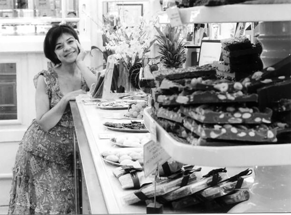 Young Maribel in her shop.